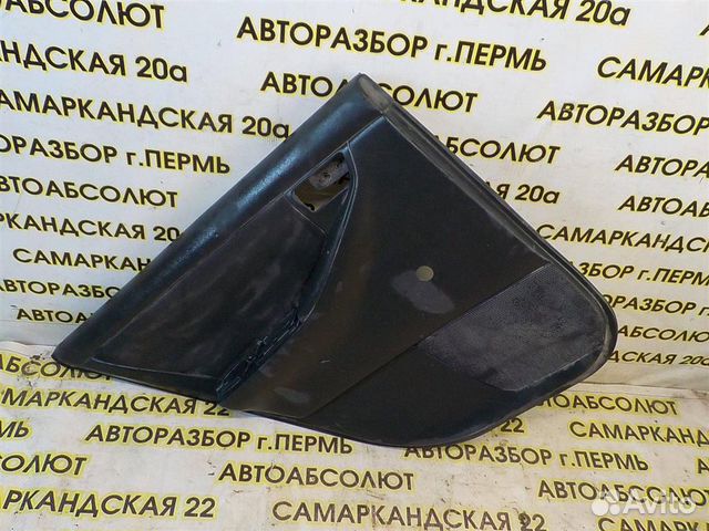 Обшивка двери задней левой Toyota Corolla (E120)