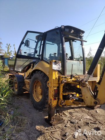 Экскаватор погрузчик caterpillar услуги