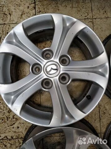 Диски бу оригинал R15 N на Mazda