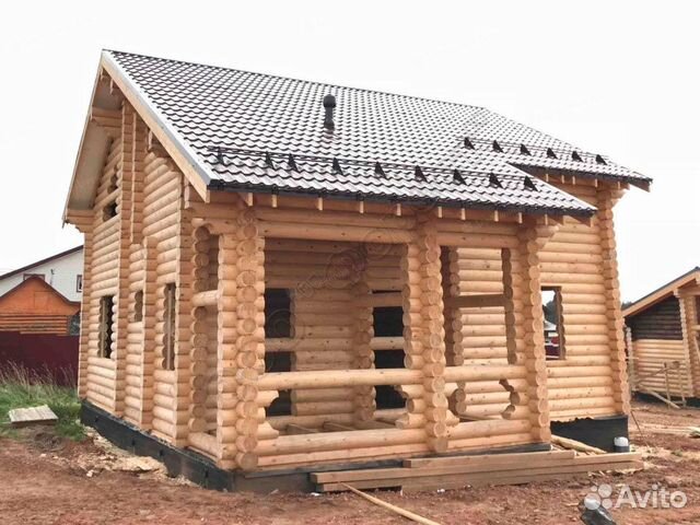 Сруб дома 7х7 м. из бревна с верандой и мансардой Сруб дома 7х7 м. из бревна с верандой и мансардой