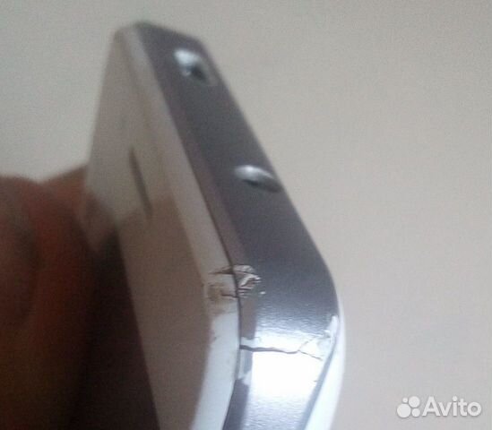 Телефон Fly iQ436i ERA Nano 9 с наушниками Телефон Fly iQ436i ERA Nano 9 с наушниками