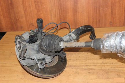 Поворотный кулак передний левый Mazda Atenza GGS3