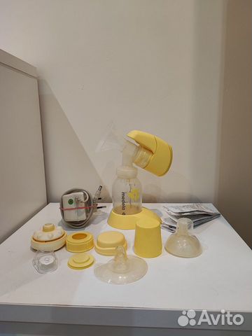 Молокоотсос medela электрический (накладки в подар