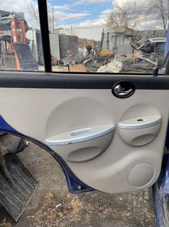 Обшивка двери Lifan Smily