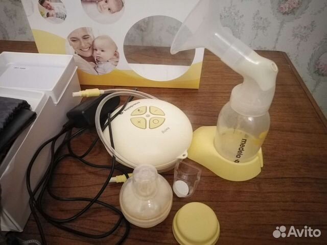 Молокоотсос medela электрический