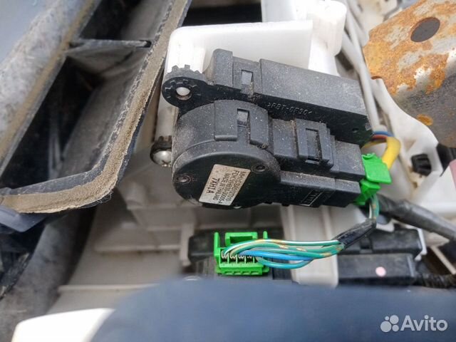 Моторчик заслонок отопителя Mitsubishi Lancer 10
