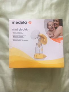 Молокоотсос Medela mini electric и Medela Calma